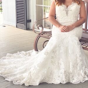 A size 14, White Allure Bridal Wedding dress